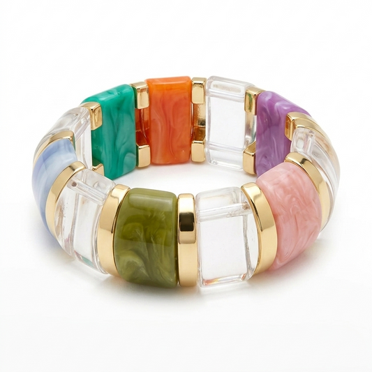 Multicolored bracelet with gold accents on a white background